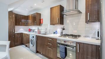 Standard Double Room | Private kitchen | Full-size fridge, microwave, oven, dishwasher