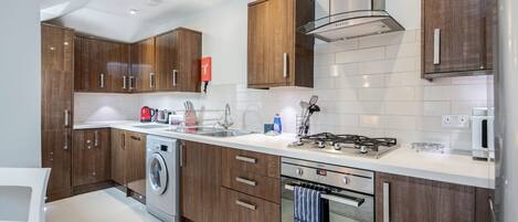 Standard Double Room | Private kitchen | Full-size fridge, microwave, oven, dishwasher