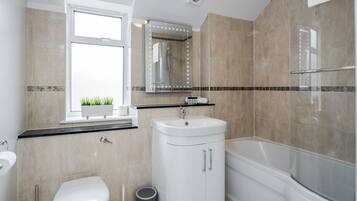 Standard Double Room | Bathroom | Combined shower/bathtub, hair dryer, towels