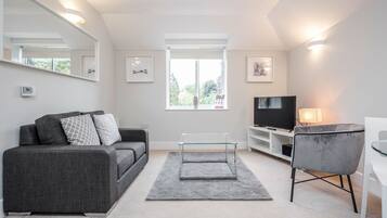 Standard Double Room | Living area | 40-inch Smart TV with digital channels, TV