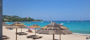 On the beach, sun loungers