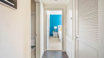 1 bedroom, desk, iron/ironing board, travel crib