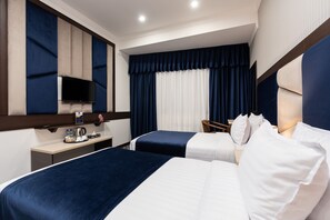 Premium bedding, down comforters, in-room safe, desk