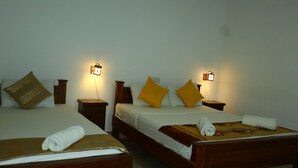 A hotel room with two beds, each with a wooden headboard, white bedding, and a brown pillow. There are bedside tables with lamps and a small clock on each. - Dream Weaver Eco Homestay Sigiriya (Sigiriya)