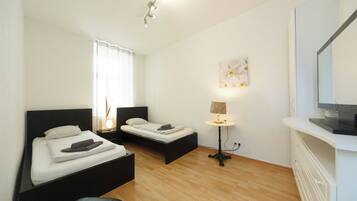 2 slaapkamers, een strijkplank/strijkijzer, gratis wifi, beddengoed