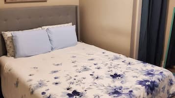 1 bedroom, desk, iron/ironing board, travel crib