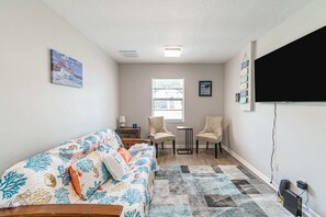 Basic House, Multiple Beds | Living room | TV