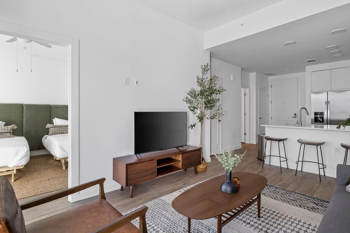 2 bedrooms, premium bedding, memory-foam beds, laptop workspace