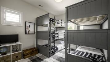 3 habitaciones, tabla de planchar con plancha y cuna de viaje