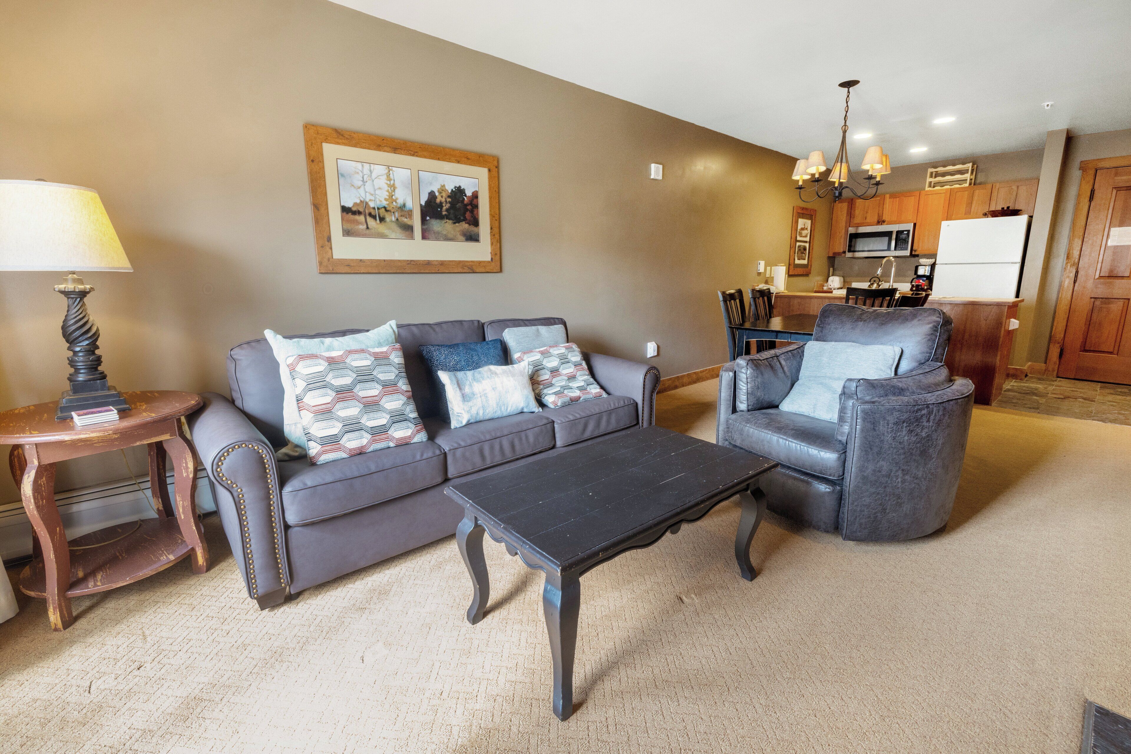 Condo, 1 Bedroom (with Murphy Bed) | Living area | 32-inch flat-screen TV with cable channels, TV