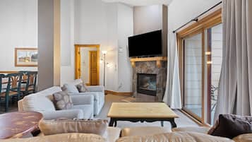 Condo, 2 Bedrooms (with Murphy Bed) | Living area | 32-inch flat-screen TV with cable channels, TV