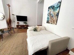 2 chambres, fer et planche à repasser, lit de bébé portatif
