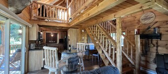 Relax at The Lincoln Log Cabin perched along the Jump River.