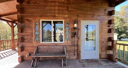 Relax at The Lincoln Log Cabin perched along the Jump River.