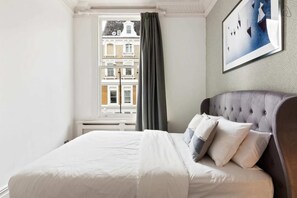 Basic Apartment, 1 Queen Bed | 1 bedroom, desk, laptop workspace, iron/ironing board