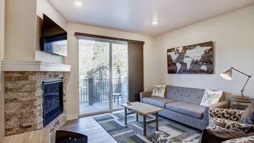 Premier Condo, 2 Bedrooms | Living area | Flat-screen TV