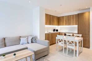 Appartement, plusieurs lits | Salle de séjour