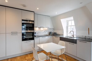 Apartment | Private kitchen | Fridge, microwave, oven, stovetop