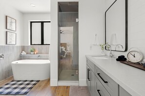Bathtub, hair dryer, towels, soap - Modern, Bright Spacious Home ~ (Peoria)