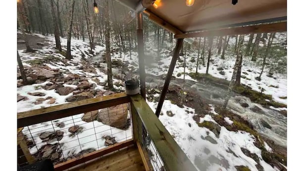 A wooden deck with a view of a snowy forest. - BEARADISE “Glamping Paradise” (Vesuvius)