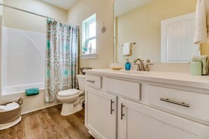 Combined shower/tub, eco-friendly toiletries, hair dryer, towels