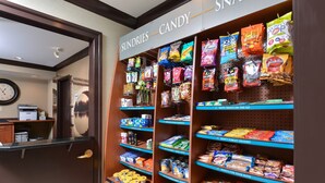 A candy display with various brands and types of sweets. - 1 Bedroom | Pool & Gym. Free Breakfast (O'Fallon)