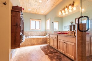 Combined shower/tub, hair dryer, towels, soap