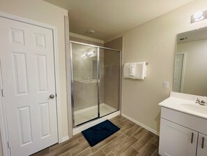Combined shower/tub, hair dryer, towels, soap