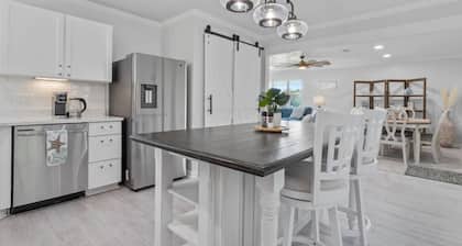 Stunning Custom Home. Walk to the Beach. Heated POOL! Elevator!