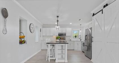 Stunning Custom Home. Walk to the Beach. Heated POOL! Elevator!