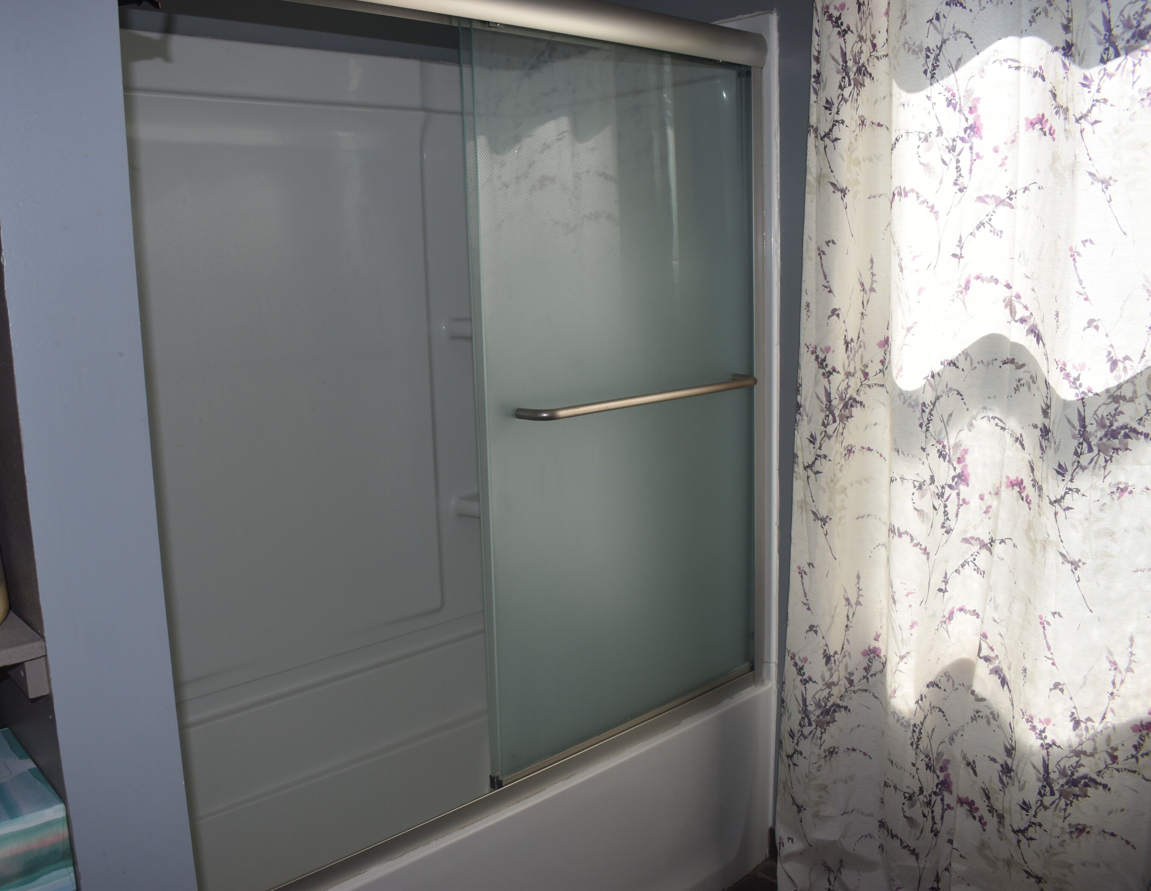 Combined shower/tub, hair dryer, towels, soap