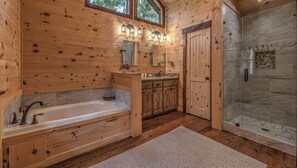 Combined shower/bathtub, hair dryer, towels - Songbird Ridge - Aska Adventure Area | Panoramic Views | Hot Tub | Outdoor Fireplace (Blue Ridge)