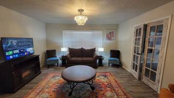 Smart TV, fireplace, books