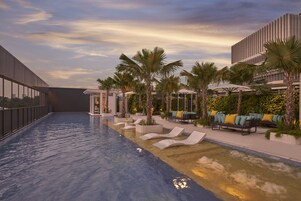 Outdoor pool, open 7:00 AM to 9:00 PM, sun loungers