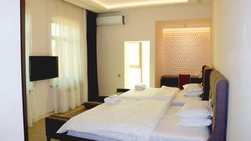 Premium bedding, memory foam beds, individually furnished, desk