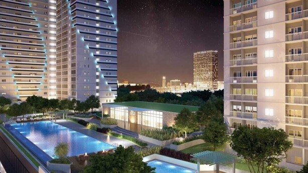 A modern high-rise building with a rooftop pool and landscaped gardens. - Beautiful Condominium With Swimming Pools Ect (Quezon City)