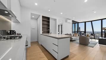 Two Bedroom Apartment | Private kitchen | Full-sized fridge, microwave, oven, stovetop