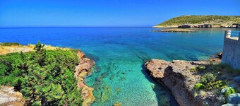 NTS  GREEK VILLA IN TO THE SEA