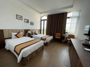 Kahden hengen deluxe-huone (kaksi sänkyä) | Näkymä rannalle/valtamerelle