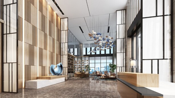 A spacious lobby with a modern design, featuring a large seating area, a central staircase, and a decorative chandelier. - Fairfield by Marriott Liaocheng Dongchangfu (Liaocheng)