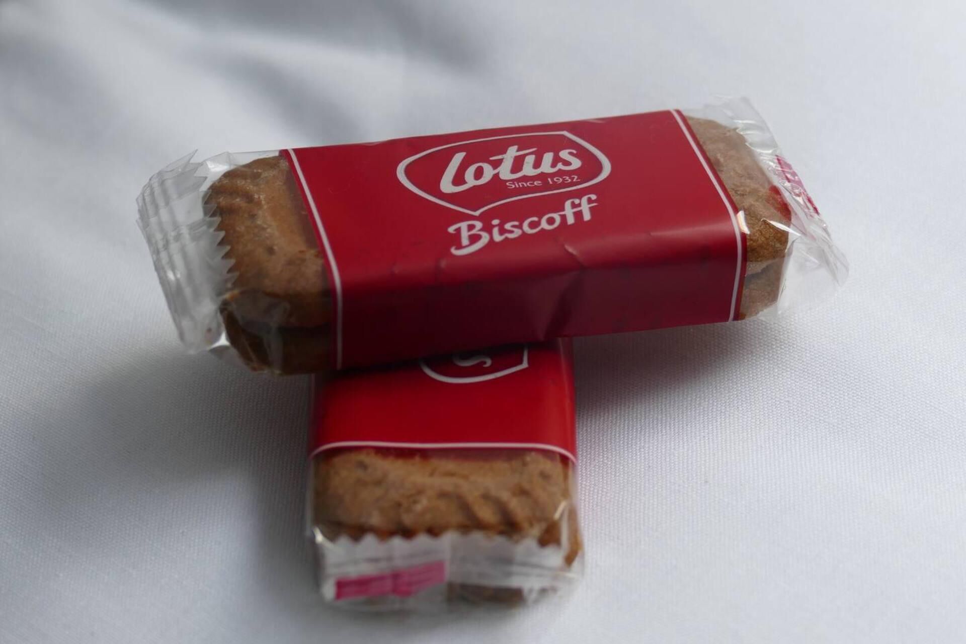 Two Lotus Biscuits in clear plastic packaging.