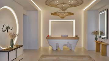A modern reception area with a unique white console, a large mirror, and a decorative ceiling light.