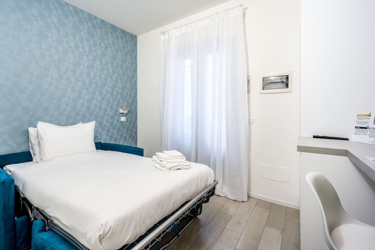 Estudio, planta baja | Tabla de planchar con plancha, cunas, wifi gratis y ropa de cama
