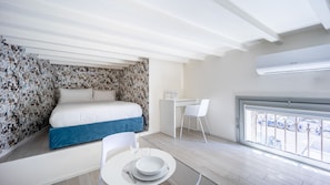 Studio, 1 Double Bed | Living area | Flat-screen TV