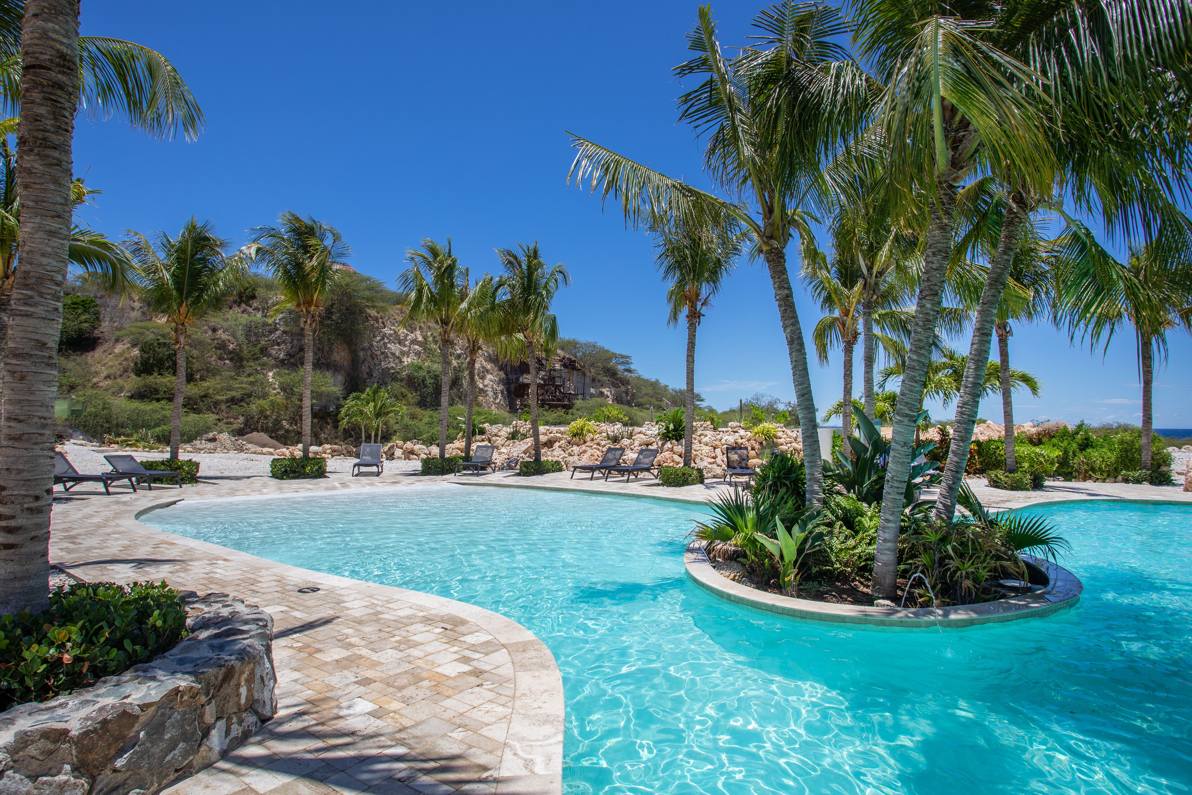 outdoor pool, pool loungers