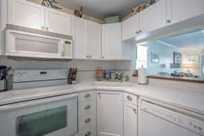 Coffee/tea maker, toaster, cleaning supplies