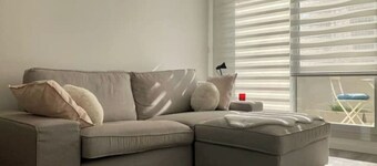 Central apartment with private parking