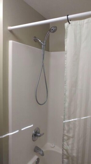 Combined shower/tub, hair dryer, towels, soap