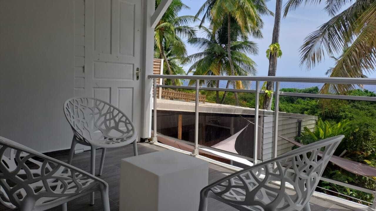 Quarto triplo superior, suíte, vista para o mar | Terraço/pátio