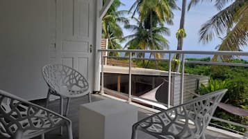 Quarto triplo superior, suíte, vista para o mar | Terraço/pátio